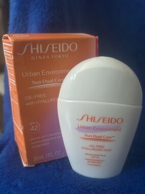 Shiseido Urban Environment Sun Dual Care SPF 42 - White & Orange